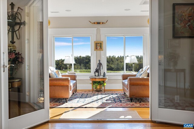 2055 Thomas Jefferson Pkwy, Charlottesville, VA 22902 - sitting room with visible vents and wood finished floors