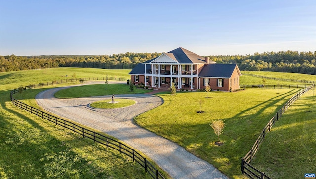 2055 Thomas Jefferson Pkwy, Charlottesville, VA 22902 - exterior space with a yard, fence, covered porch, a rural view, and curved driveway