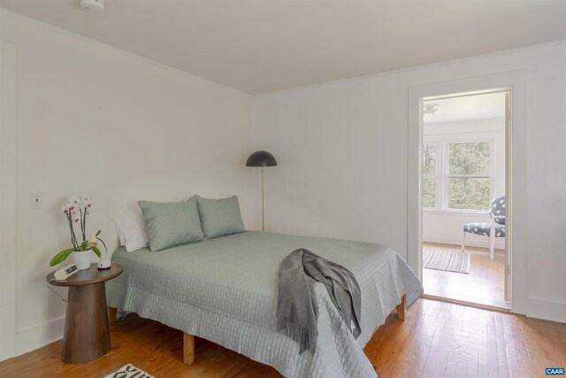 5072 Scottsville Rd, Charlottesville, VA 22902 - bedroom featuring wood finished floors and ornamental molding