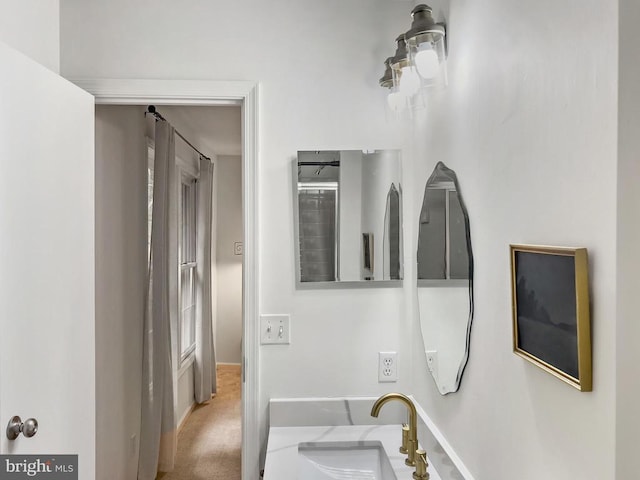11600 Saddleback Dr, Fredericksburg, VA 22407 - bathroom with baseboards and a sink