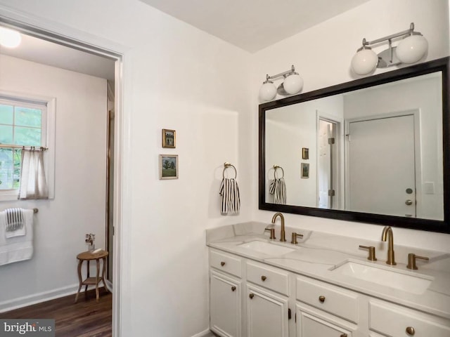 11600 Saddleback Dr, Fredericksburg, VA 22407 - bathroom with double vanity, baseboards, and wood finished floors