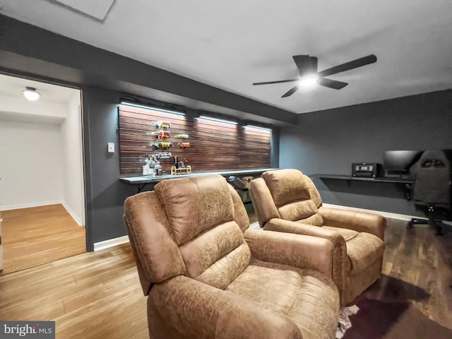 11600 Saddleback Dr, Fredericksburg, VA 22407 - home theater room featuring ceiling fan, wood finished floors, bar, and baseboards