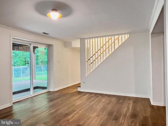 11600 Saddleback Dr, Fredericksburg, VA 22407 - empty room featuring wood finished floors, baseboards, stairway, and crown molding