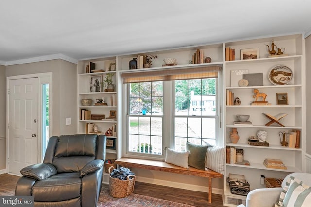 11600 Saddleback Dr, Fredericksburg, VA 22407 - living area with wood finished floors, baseboards, crown molding, and built in shelves