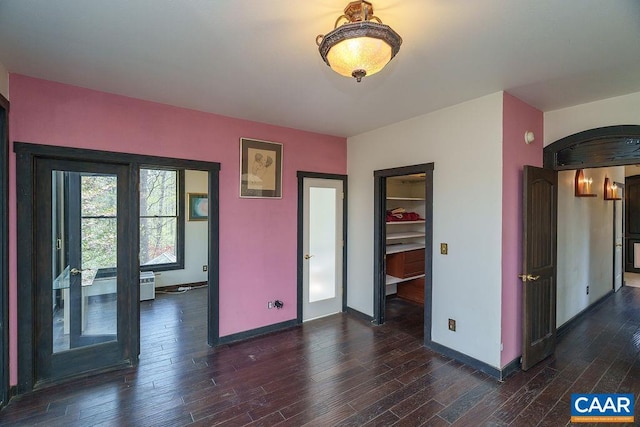 7035 Blackwells Hollow Rd, Crozet, VA 22932 - unfurnished dining area with dark wood finished floors and baseboards