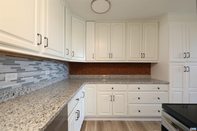 laundry room featuring light wood finished floors
