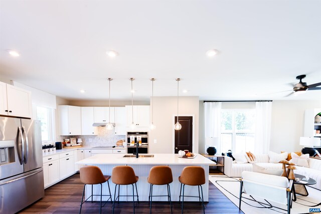3076 Horizon Rd, Charlottesville, VA 22902 - kitchen featuring appliances with stainless steel finishes, plenty of natural light, a kitchen bar, and open floor plan