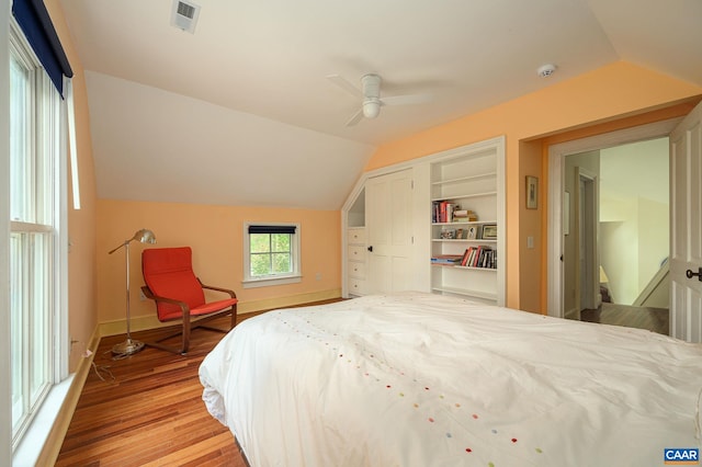 1112 Park St, Charlottesville, VA 22901 - bedroom with light wood-style floors, vaulted ceiling, a closet, and ceiling fan