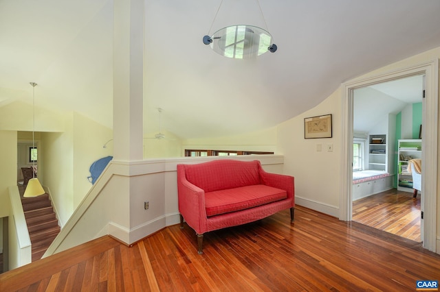 1112 Park St, Charlottesville, VA 22901 - living area featuring lofted ceiling, an upstairs landing, wood-type flooring, and healthy amount of natural light
