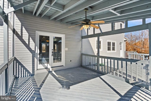 deck featuring french doors and a ceiling fan