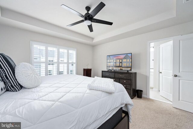 4114 Bolton Ct, Fredericksburg, VA 22408 - carpeted bedroom with a tray ceiling, a ceiling fan, and baseboards