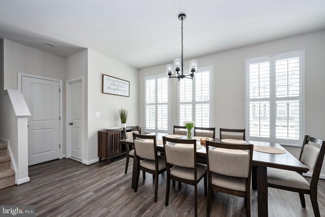 4114 Bolton Ct, Fredericksburg, VA 22408 - dining room with dark wood-style flooring, a chandelier, stairway, and baseboards