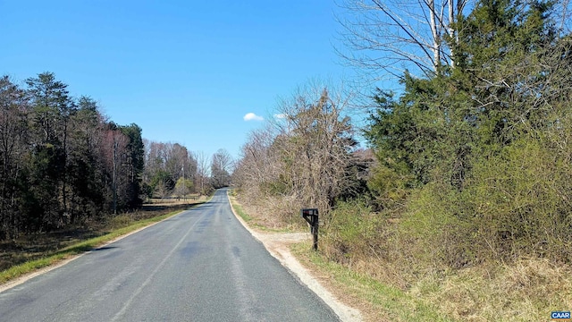 983 Williamstown Rd, Shipman, VA 22971 - view of asphalt road featuring a forest view