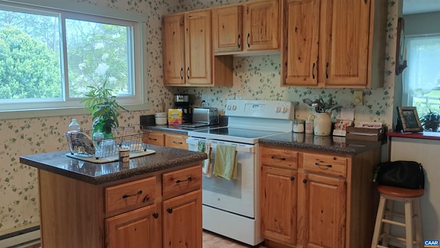 983 Williamstown Rd, Shipman, VA 22971 - kitchen featuring white range with electric cooktop, wallpapered walls, a kitchen island, baseboard heating, and dark stone countertops