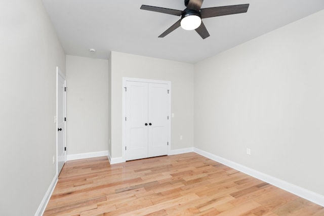 409 Peterson Ln, Waynesboro, VA 22980 - unfurnished bedroom featuring light wood finished floors, baseboards, a ceiling fan, and a closet