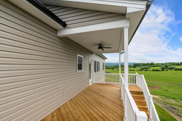 409 Peterson Ln, Waynesboro, VA 22980 - wooden deck with a ceiling fan and a lawn