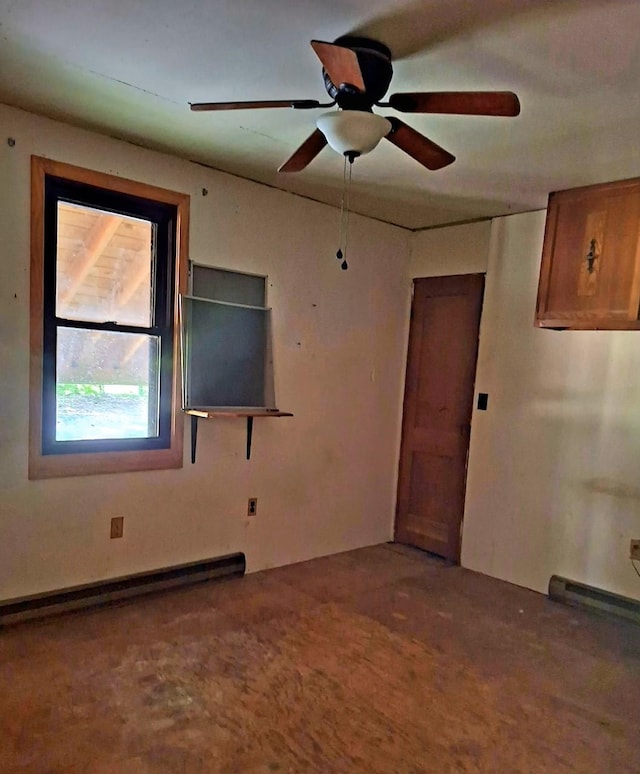 2219 Hewitt Rd, Swoope, VA 24479 - unfurnished room featuring a baseboard radiator and a ceiling fan