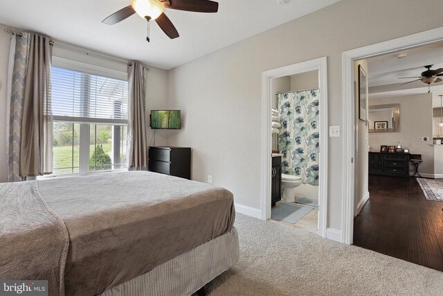 5761 Agecroft Rd, Spotsylvania, VA 22551 - bedroom featuring baseboards, carpet, ensuite bathroom, and a ceiling fan