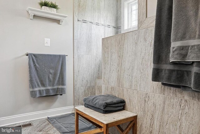 5761 Agecroft Rd, Spotsylvania, VA 22551 - bathroom featuring baseboards