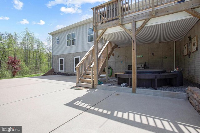 5761 Agecroft Rd, Spotsylvania, VA 22551 - view of patio / terrace featuring a hot tub and stairway