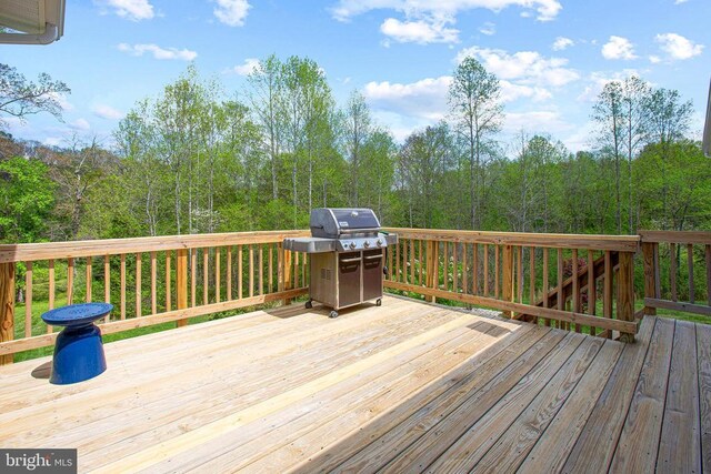 5761 Agecroft Rd, Spotsylvania, VA 22551 - deck featuring a grill and a forest view