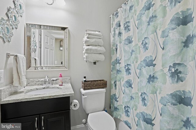 5761 Agecroft Rd, Spotsylvania, VA 22551 - bathroom featuring vanity, toilet, and a shower with shower curtain