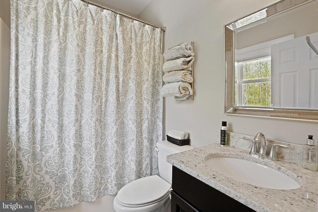 5761 Agecroft Rd, Spotsylvania, VA 22551 - bathroom featuring toilet, vanity, and a shower with shower curtain