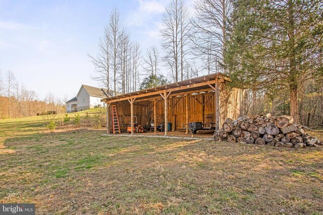 5761 Agecroft Rd, Spotsylvania, VA 22551 - view of pole building featuring a yard