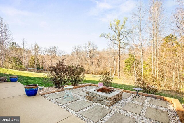 5761 Agecroft Rd, Spotsylvania, VA 22551 - view of patio / terrace featuring an outdoor fire pit