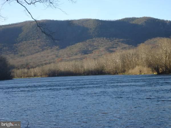 property view of water featuring a mountain view