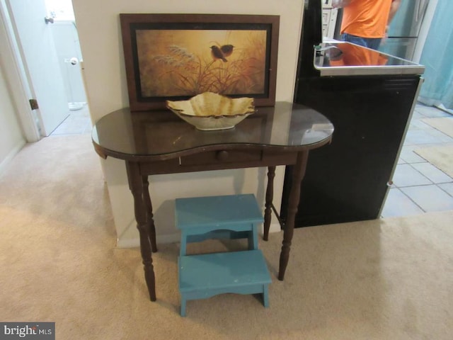 view of carpeted dining area