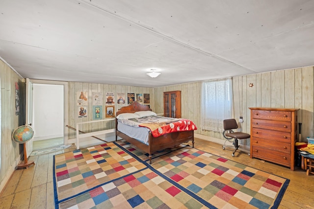 bedroom with hardwood / wood-style floors