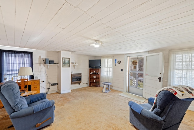 living room with light colored carpet and wood ceiling