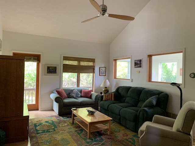 living room featuring a wealth of natural light, high vaulted ceiling, and ceiling fan