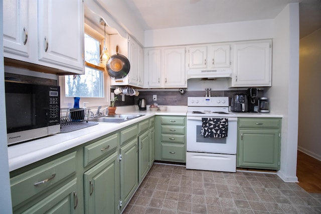 kitchen featuring white cabinetry, sink, and white range with electric cooktop