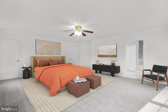 carpeted bedroom with ceiling fan, ensuite bathroom, and ornamental molding