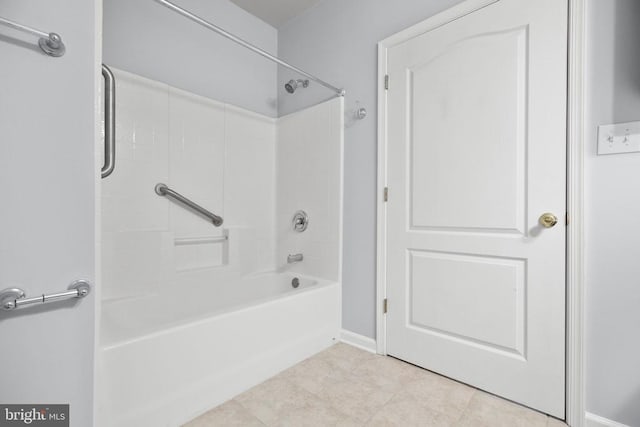 full bathroom with tile patterned flooring, bathtub / shower combination, and baseboards