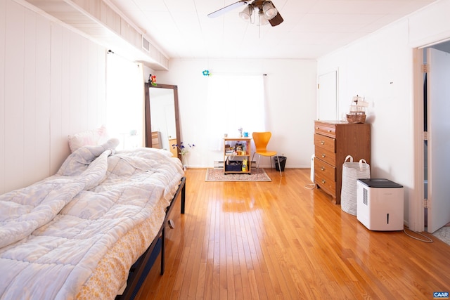 bedroom featuring ceiling fan and light wood-type flooring