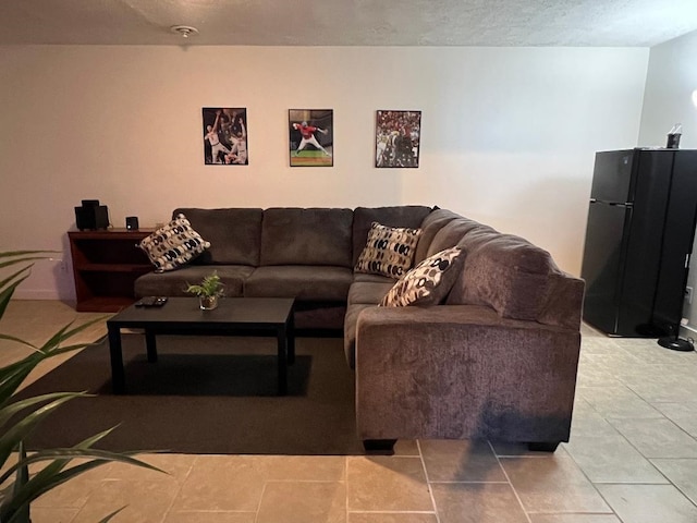 living area featuring light tile patterned floors