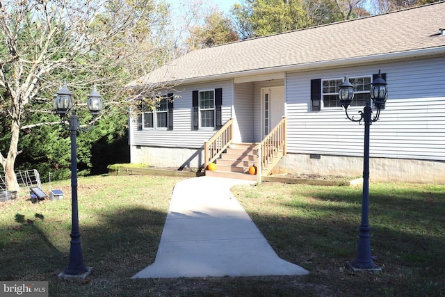 view of front of home with a front yard