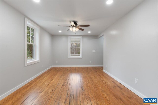 bathroom with visible vents, vanity, and toilet