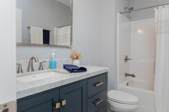 bathroom with shower / tub combo with curtain, vanity, and toilet