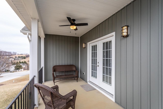 balcony featuring ceiling fan and french doors