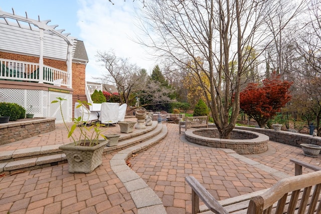 view of patio featuring stairway and a pergola