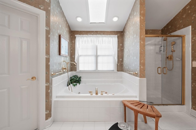 full bathroom with tile patterned floors, a tub with jets, a shower stall, and wallpapered walls