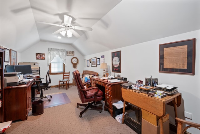 office space with baseboards, carpet, a ceiling fan, and vaulted ceiling