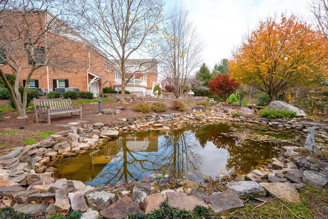 view of water feature featuring a garden pond