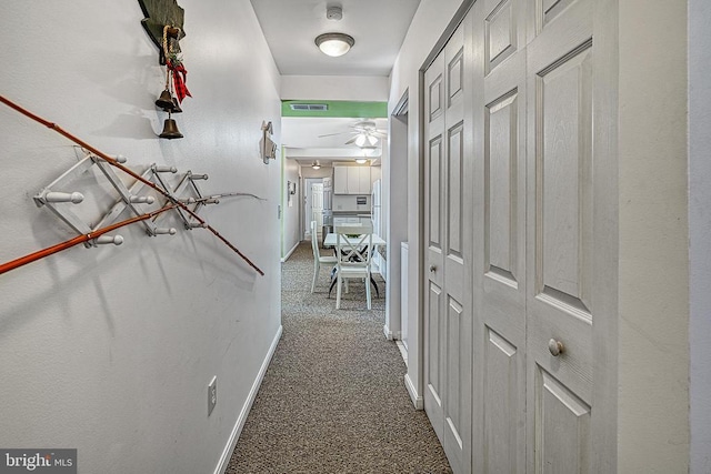 corridor with carpet floors