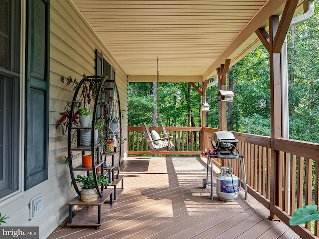 wooden terrace with covered porch