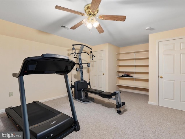 exercise area with carpet floors and ceiling fan